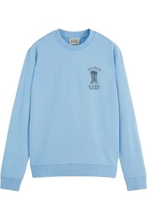 Scotch&Soda De sweater Left Chest Artwork van is een casual heren sweater met een grafisch patroon, gemaakt van comfortabel katoen