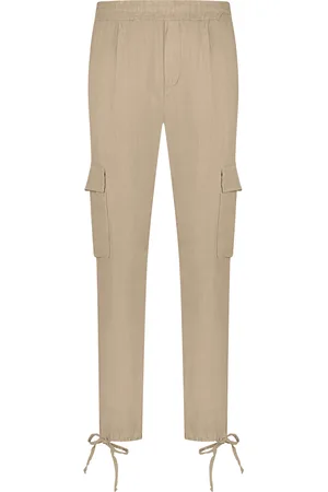 In Shape De Pantalon Floor Solid van is een stijlvolle cargo broek met een elastische taille