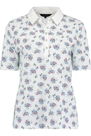 bloomings Het polo shirt is een casual dames polo met opstaande kraag en knoopsluiting, ontworpen voor een ontspannen pasvorm