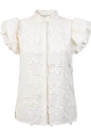 Aaiko De Blouse Gezana van is een stijlvolle dames blouse met een opvallend bloemenpatroon