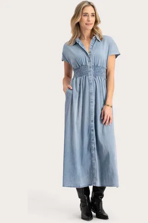 Florèz De Jurk Estelle van is een elegante dames jurken mouwloos met een elastische taille en knopen
