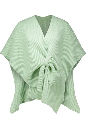 Bomont De Gina omslag van is een stijlvolle poncho met een effen patroon, ideaal voor casual gelegenheden