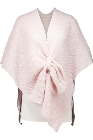 Bomont De Gina omslag van is een stijlvolle poncho met een effen patroon, ideaal voor casual gelegenheden