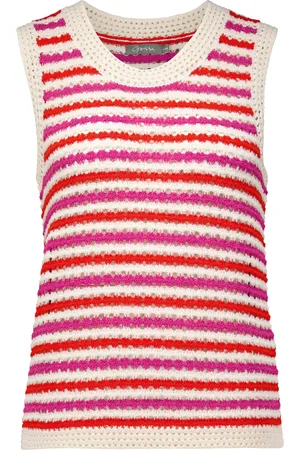 Geisha De Top van , een stijlvolle dames top mouwloos, combineert casual stijl met een speels streeppatroon en een comfortabele ronde hals