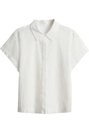 Opus De Blouse Fessin van is een casual dames blouse met een losse pasvorm