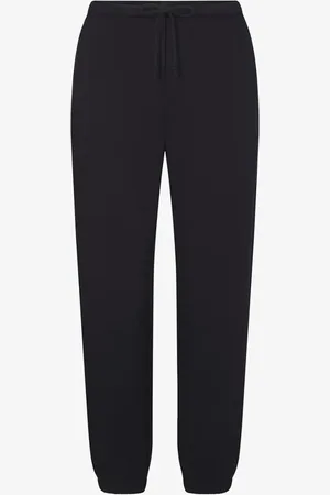 SKIMS Cotton Fleece mid waist tapered fit loungebroek met steekzakken