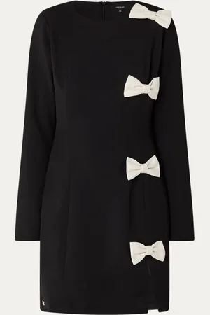 NIKKIE. Haisyn mini jurk met strik detail en split