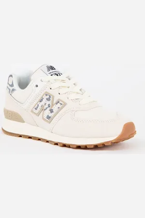 New Balance 574 sneaker van suède met details van canvas