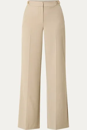 NIKKIE. Iringa high waist wide fit pantalon met steekzakken