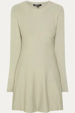NIKKIE. Jintha mini trui-jurk met stretch