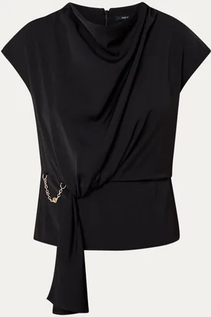 NIKKIE. Imani top met knoopdetail en watervalhals
