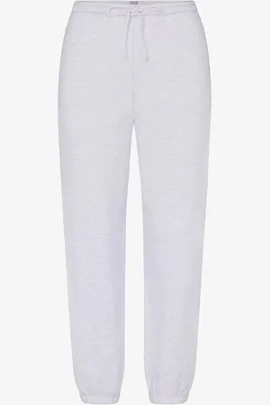 SKIMS Cotton Fleece mid waist tapered fit loungebroek met steekzakken