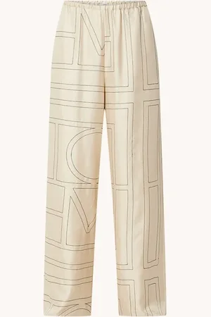 Totême High waist straight fit cropped pantalon van zijde met grafische print