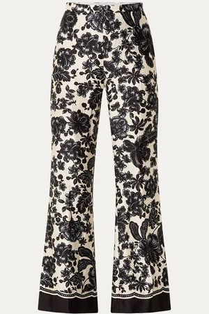 Sandro High waist flared broek van satijn met bloemenprint