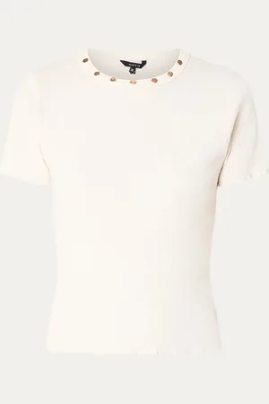 NIKKIE. Ivy top met ribstructuur en studs