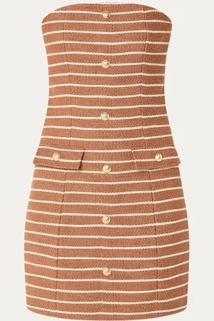 NIKKIE. Isario strapless mini jurk met sierknopen
