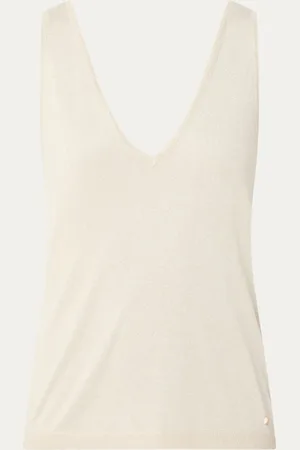 NIKKIE. Jean top met lurex en V-hals
