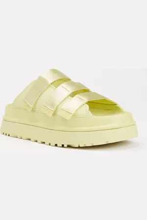 UGG GoldenGlow slipper met logo