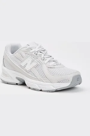 New Balance 740 sneaker van suède met mesh details