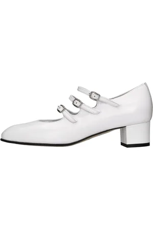 Carel Schoenen met witte hakken