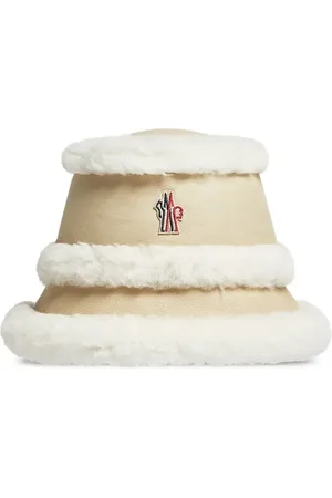 Moncler Vissershoed met lammy afwerking