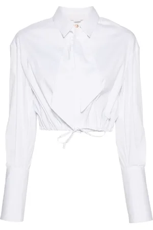GENNY Blouse met logoplakkaat