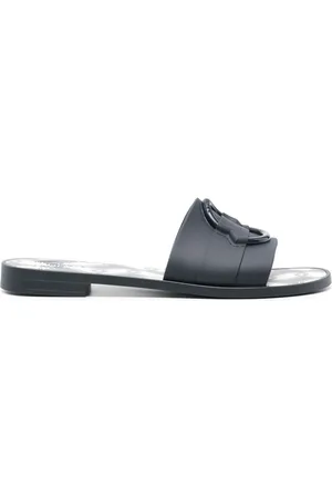 Moncler Mon slippers met gegraveerd logo