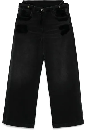 The Attico Jeans met gelaagde taille