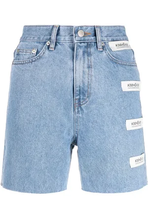 KIMHEKIM High waist denim shorts met logopatches