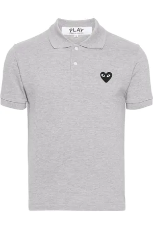 Comme des Garçons Piquè poloshirt met hartpatch
