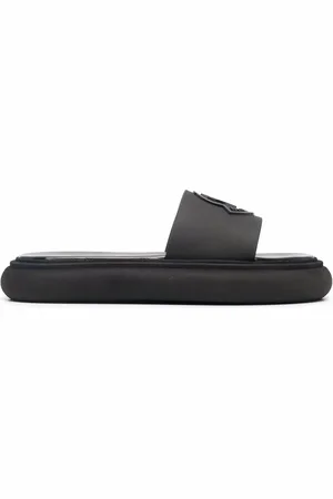 Moncler Jeanne slippers met logo reliëf