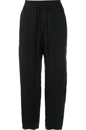 Uma Raquel Davidowicz Broek met trekkoordtaille