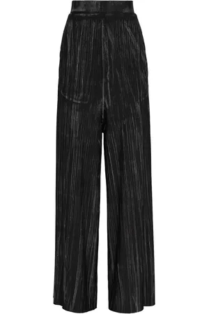 Uma Raquel Davidowicz Broek met wijde pijpen