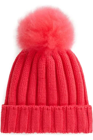 Woolrich Scheerwol muts met pompon