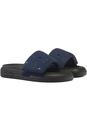 MCM Slippers met monogram