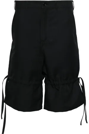 Comme des Garçons Shorts met wijde pijpen