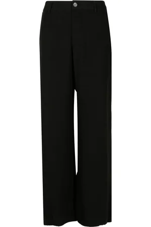 Uma Raquel Davidowicz Broek met wijde pijpen
