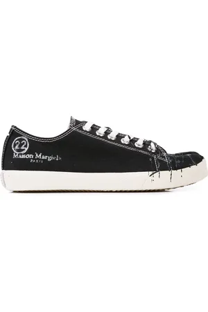 Maison Margiela Tabi sneakers met verfspatten