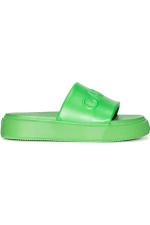 Ganni Slippers met logo