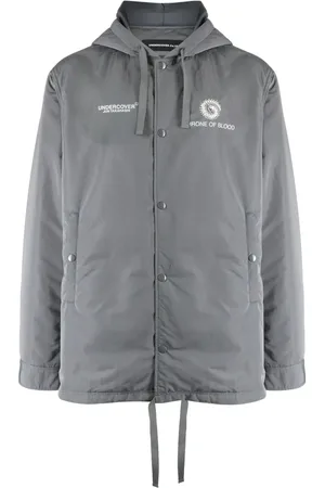 UNDERCOVER Jack met capuchon en print