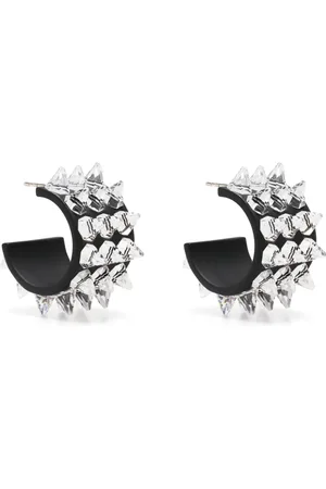 Amina Muaddi Oorringen met spikes