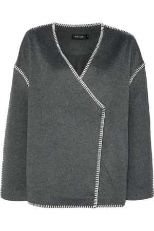 tout a coup Wikkeljack met stikseldetail