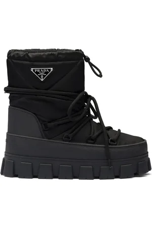 Prada Sneeuwlaarzen met logo plakkaat