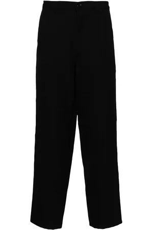 Comme des Garçons Broek met toelopende pijpen