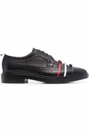 Thom Browne Longwing brogues met drie strikken