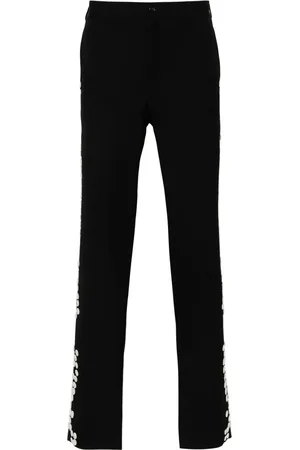 Comme des Garçons Broek verfraaid met knopen