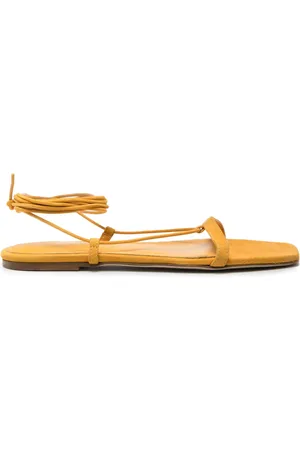Totême The Tie suède sandalen