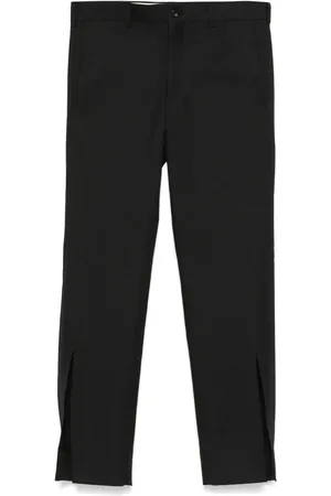 Comme des Garçons Broek met toelopende pijpen