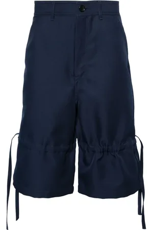 Comme des Garçons Shorts met wijde pijpen