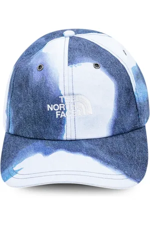 Supreme X TNF pet van gebleekt denim